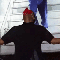 Venezuelan migrant rescued from El Salvador's CECOT torture center kneeling on Venezuelan soil after deboarding the plane that brought him back home, July 18, 2025. Photo: Con el Mazo Dando.