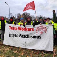 Source: https://en.wikipedia.org/wiki/Tesla_and_trade_unions#/media/File:Tesla-workers-against-fascism.jpg