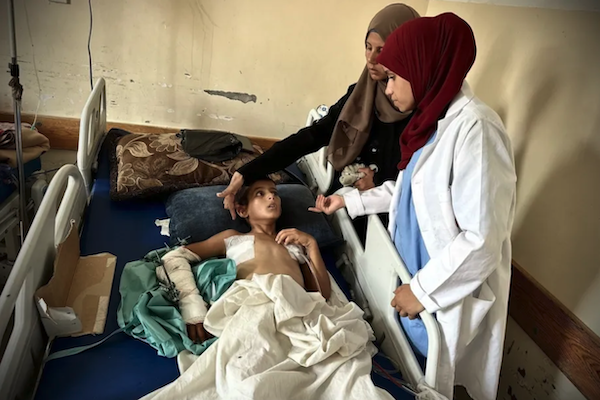 MR Online | 11 year old Musa al Shaer lies on a hospital bed at Nasser Hospital on August 13 2025 in Khan Yunis Gaza after being injured while going to collect food from humanitarian aid point in Rafah southern Gaza Doaa Albaz  Anadolu Agency | MR Online