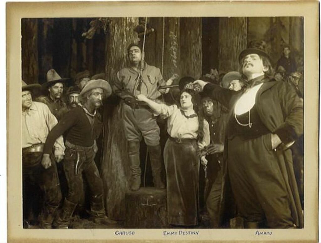 fbf9877804102e182f78f94cd71d8bd92f9c056d | MR Online Scene from the Third Act of the premiere of The Girl of the Golden West La fanciulla del West by Puccini at the Metropolitan Opera 1910