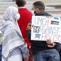 Pro-Palestinian demonstrators gather for a mock trial against the University of Michigan's board of regents on the university's campus in Ann Arbor, Michigan, on 21 April 2025 (Jeff Kowalsky/AFP)
