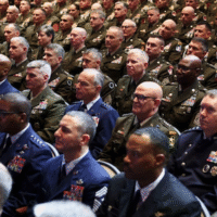 Members of the military attend a meeting convened by U.S. Defense Secretary Pete Hegseth in Quantico, Virginia. REUTERS/Kevin Lamarque