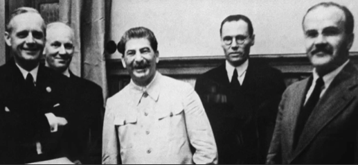 August 23, 1939, at the Kremlin: Joachim von Ribbentrop, Josef Stalin, and Vyacheslav Molotov at the signing of the non-aggression pact.