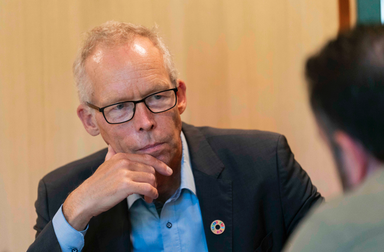Johan Rockström while being interviewed by Mongabay at the 2025 Frontiers Planet Prize event in June. Rockström is the director of the Potsdam Institute for Climate Impact Research (PIK) in Germany and led the international team of researchers who originated the planetary boundary framework in 2009. Image courtesy of Marius Burgelman/Frontiers Foundation.