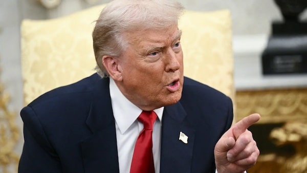 US President Donald Trump takes questions from the press during a meeting with Saudi Crown Prince in the Oval Office of the White House on 18 November, 2025 (AFP)