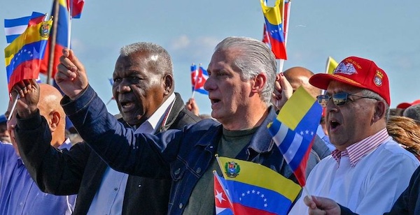 MR Online   Cuban President Miguel Diaz Canel waves a Venezuelan national flag in Havana on January 3 2026 Photo by Adalberto RoqueAFP via Getty Images   MR Online