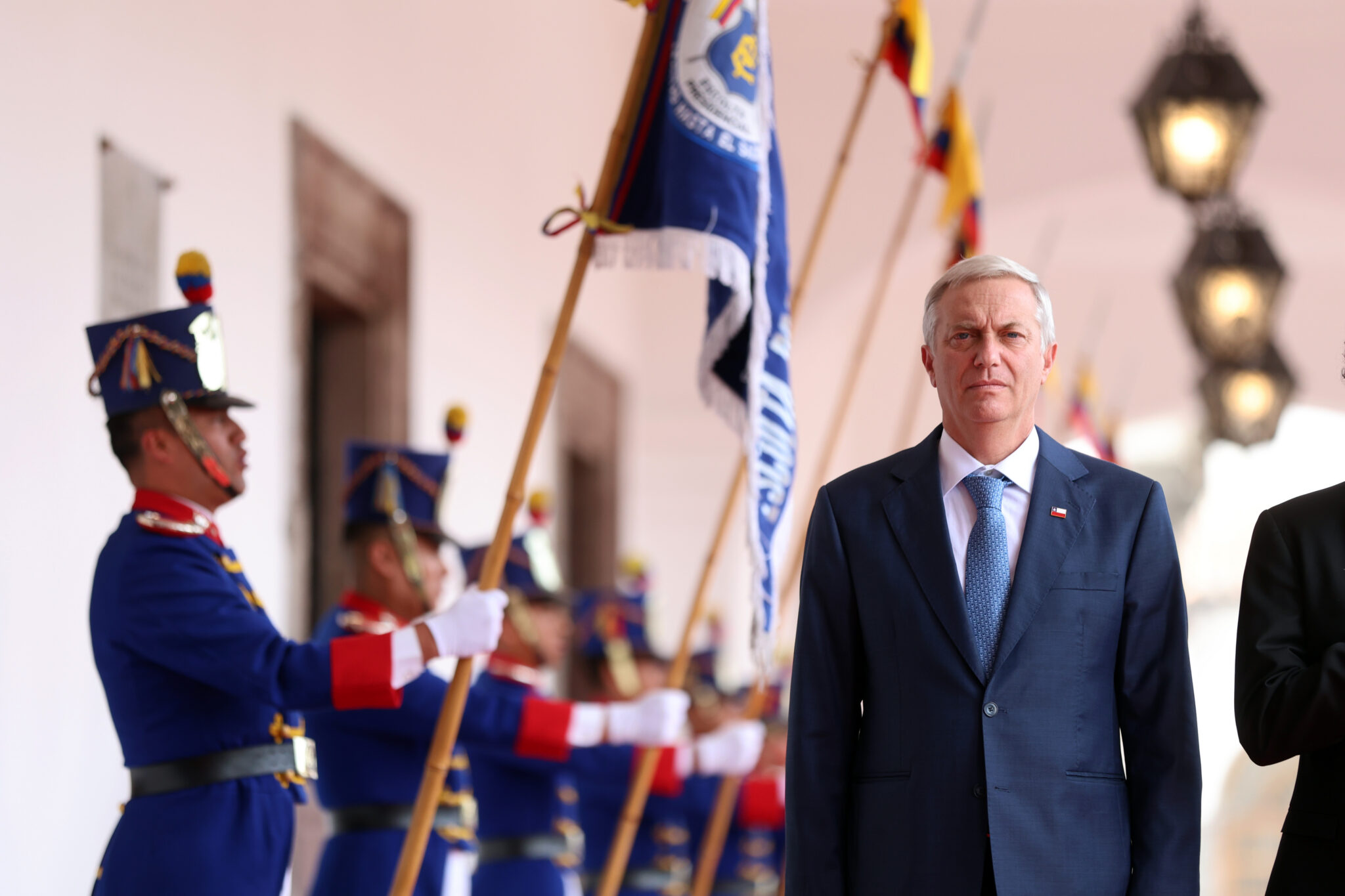MR Online   Chilean president elect José Antonio Kast faces the camera A row of Ecuadorian ceremonial guards stands to the left   MR Online