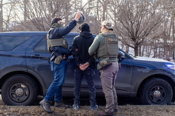 MR Online   ICE agents search the passenger of a truck as they arrest both him and the driver during a traffic stop Wednesday Feb 11 2026 on Bottineau Blvd in Robbinsdale Photo Nicole NeriMinnesota Reformer   MR Online