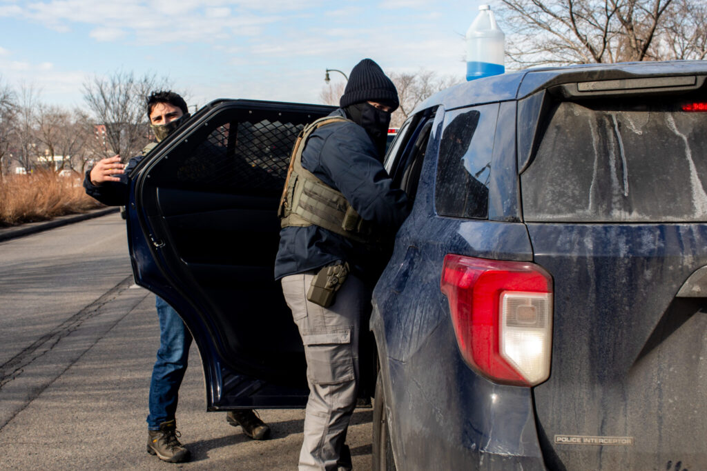 ICE agents arrest two men during a traffic stop Wednesday, Feb. 11, 2026 on Bottineau Blvd. in Robbinsdale. (Photo by Nicole Neri/Minnesota Reformer)
