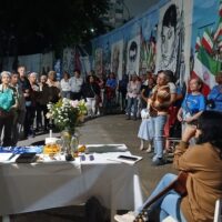 People attend a vigil for the victims of the January 3, 2026 U.S. attack on Venezuela.