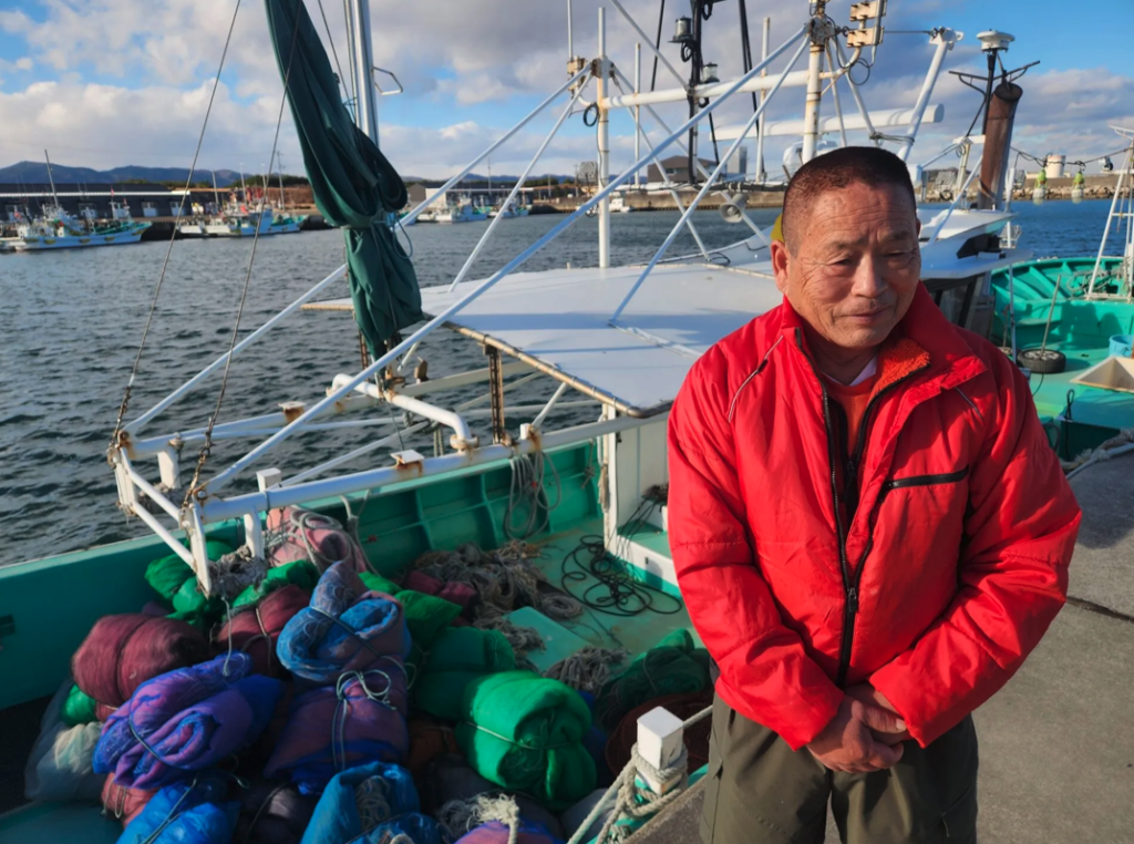 Haruo Ono and his boat at Shinchi harbor, Fukushima. Thomas A. Bass