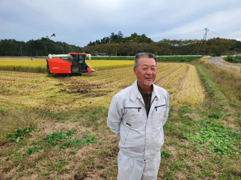 Ryoichi Sato in one of his rice paddies near Fukushima. Thomas A. Bass