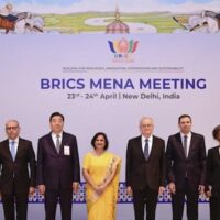 In this image posted on April 24, 2026, Ministry of External Affairs Secretary (South) Neena Malhotra poses for a group photograph during the BRICS MENA meeting, in New Delhi. Photo: @MEAIndia/X via PTI