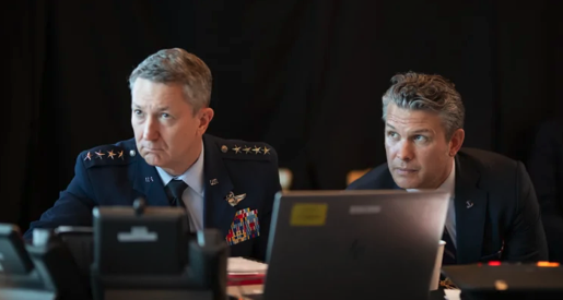 General Caine and Secretary Hegseth in photograph of their watching an operation on March 2, together with Trump.