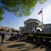 Members of the media set up outside the U.S. Supreme Court ahead of President Donald Trump’s expected arrival on April 1, 2026. The court heard oral arguments that day in a case to determine if Trump’s executive order ending birthright citizenship is constitutional. (Photo by Al Drago/Getty Images)