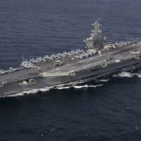 U.S. aircraft carrier USS Abraham Lincoln operates at a distance after retreating from Iran’s coast under missile threat, underscoring limits on enforcing a close blockade. Photo: U.S. Navy Mass Communication Specialist 3rd Class Clint Davis
