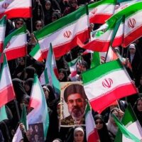 Iranian women hold their country's flags and a portrait of Iranian Leader Sayyed Mojtaba Khamenei during a rally in support of the Iranian leader marking National Girl's Day in Tehran , Iran, April 17, 2026. (Photo: Ap)