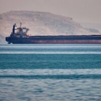 A bulk cargo ship sits at anchor in the Strait of Hormuz off Bandar Abbas, Iran. May 2, 2026. (Photo: AP)