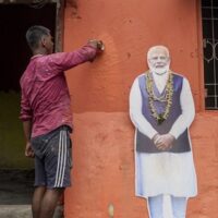 A worker paints over a TMC office after BJP wins the West Bengal Assembly elections, in Kolkata, West Bengal, Tuesday, May 5, 2026. Photo: PTI