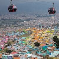 Cable cars function as public transport and offer views of the colorful houses in Ciudad Bolivar, one of Bogotá's most impoverished districts. Photo: Mussi Katz
