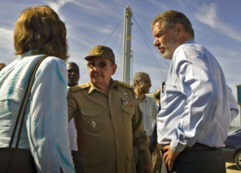 Decades of partnership: Cuban President Raul Castro, center, listens to a translator as Ian Delaney, then-president of the Canadian company Sherritt International Corp., right, looks on during a visit to a gas processing plant in Boca de Jaruco, Cuba, June 6, 2007. | Adalberto Roque / AP
