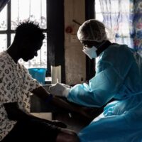 A patient is tested during the Ebola response at the General Referral Hospital of Mongbwalu in Ituri province, eastern Democratic Republic of Congo, May 20. The Bundibugyo strain spread for weeks before it was confirmed.