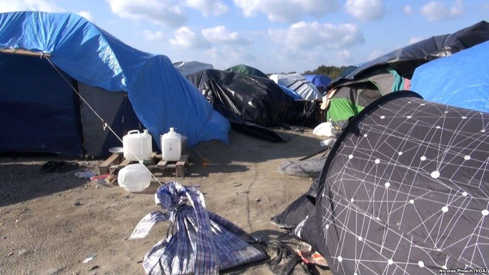A migrant camp in Calais, France (Wikimedia Commons, 2015)