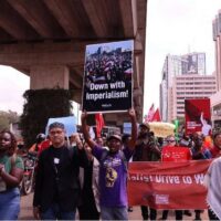 COMRADES FROM THE COUNTER-SUMMIT MARCH IN PROTEST AGAINST FRENCH IMPERIALISM (AUTHOR, 2026)