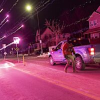 DHS agents deploy gas and pepper balls against demonstrators following the January 14 shooting in North Minneapolis. (Mostafa Bassim/Anadolu via Getty)