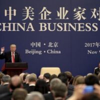Trump and Xi at a U.S.-China business exchange in Beijing on Nov. 9, 2017. Trump is returning to China with another delegation of top U.S. corporate executives as Washington seeks deals, leverage and help managing crises of its own making.