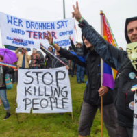Protesters outside Ramstein Air Base in Germany. [Source: nbcnews.com]