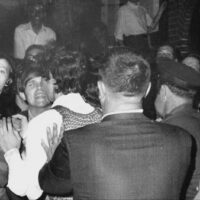 The only known photograph taken during the first night of the Stonewall Riots, by photographer Joseph Ambrosini, shows youth scuffling with NYPD officers.