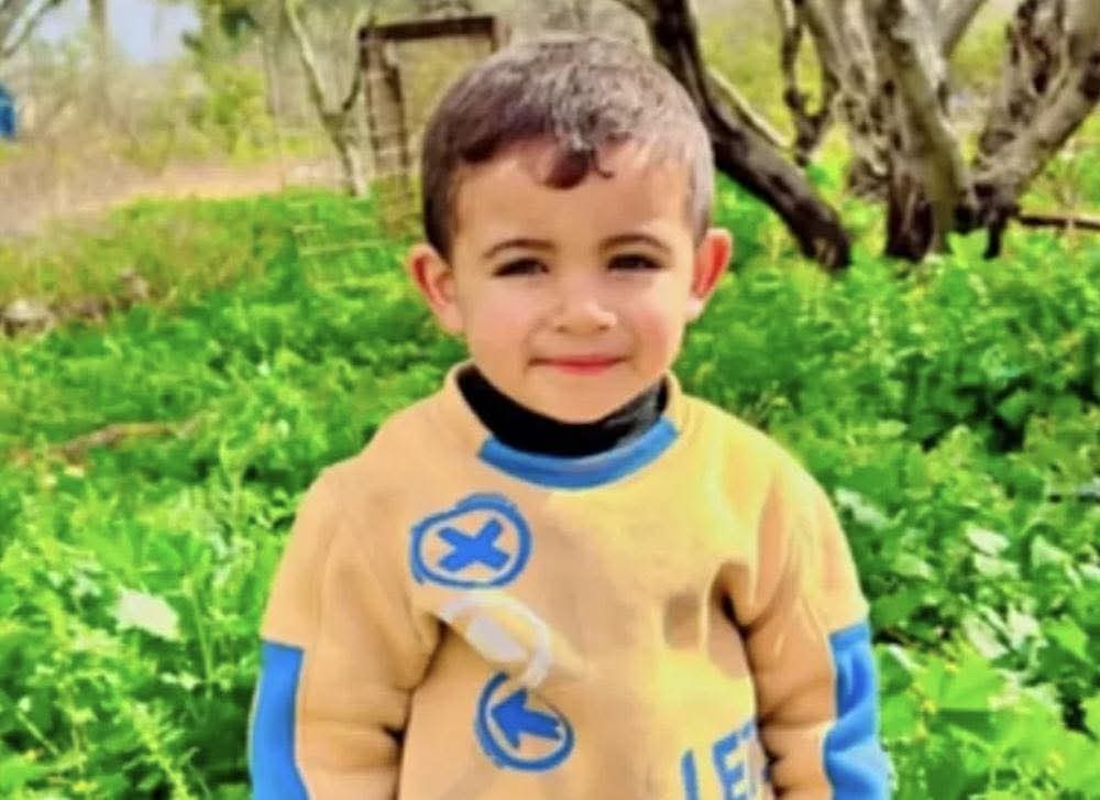 RAYYAN ABU AL-AJEEN, 3, WAS SHOT AND KILLED BY ISRAELI SOLDIERS WITH A BULLET TO THE HEAD WHILE IN HIS FATHER’S ARMS ON JUNE 14, 2026. (PHOTO: ABU AL-AJLEED FAMILY)