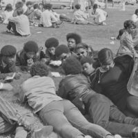 Black Panthers in a reading circle, credit: Pirkle Jones