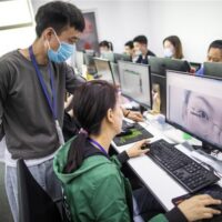 AI depends on human labor. In China, companies that automate must still deal with workers, contracts and unions.