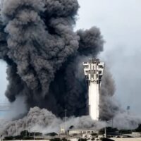 Smoke engulfs the Vessel Traffic Service tower at Iran’s Chabahar port after U.S. airstrikes on July 17. The tower, which coordinated civilian shipping and rescue operations for fishing crews in the Gulf of Oman, collapsed shortly afterward.