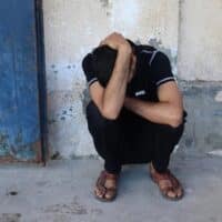 A Palestinian mourns the death of Al Jazeera journalist Ahmed Wishah, who was killed in an Israeli strike, at Al-Aqsa Martyrs Hospital in Deir el-Balah in the central Gaza Strip in 21 June 2026 (Eyad Baba/AFP)
