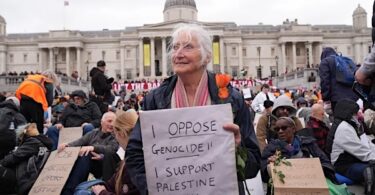 Protesters taking part in a demonstration organised by Defend our Juries, in support of Palestine Action in Trafalgar Square, London, October 4, 2025