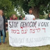 MEMBERS OF ZIDOVSKY HLAS SOLIDARITY (JEWISH VOICE OF SOLIDARITY) AT A PROTEST IN PRAGUE.