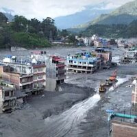 Screen grab of a drone footage from Reuters news agency shows excavators clearing mud in Nuwakot, Nepal. Source: BBC- Reuters / Fair use
