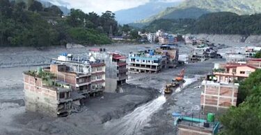 Screen grab of a drone footage from Reuters news agency shows excavators clearing mud in Nuwakot, Nepal. Source: BBC- Reuters / Fair use