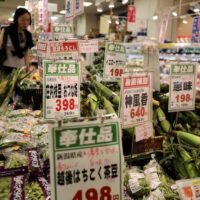 Shoppers at a Tokyo supermarket. The U.S. war on Iran has driven up Japan’s oil and shipping costs, while the falling yen makes imported food and fuel still more expensive.