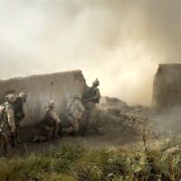Soldiers from Bravo Company, Royal Canadian Regiment, enter a suspected Taliban stronghold in Pashmul, a small village a few kilometres north of Panjwai District. Photo by Graeme Smith/QOR Museum/Flickr.