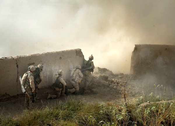 Soldiers from Bravo Company, Royal Canadian Regiment, enter a suspected Taliban stronghold in Pashmul, a small village a few kilometres north of Panjwai District. Photo by Graeme Smith/QOR Museum/Flickr.