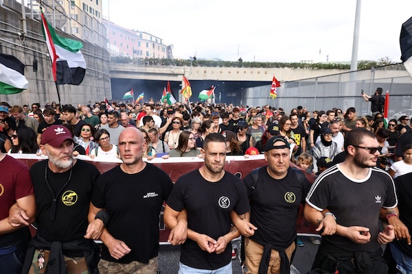 Dockworkers march in Genoa, Italy, on Sept. 22, 2025, during a nationwide strike in solidarity with Gaza and against arms shipments to Israel. Ports are one of the places where workers have the power to block the war machine — and shut one of capitalism’s ways out of crisis.