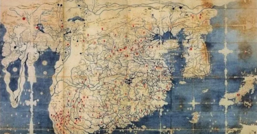 The Gangnido Map (Honil Kangni Yoktae Kukto Chi To), a historic 1402 Korean world map (shown here in the c. 1470 Ryūkoku copy), depicting a Sino-centric worldview with a massively enlarged China and Korea, alongside early East Asian renderings of Africa, Europe, and the Middle East on its western periphery. Visible in this reproduction, the sprawling parchment layout starkly centres on the massive, highly detailed landmasses of East Asia, dwarfing the surrounding regions. Courtesy of Ryūkoku University Library, Kyoto.