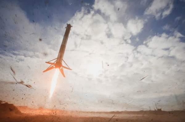 A SpaceX Falcon Heavy rocket booster descends to landing after launch with a classified payload for the US Space Force at Cape Canaveral, Florida, the United States, November 1, 2022 [Joe Skipper/Reuters]