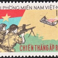 A Vietnamese stamp depicting two Vietnamese resistance fighters shooting down a US Army helicopter.