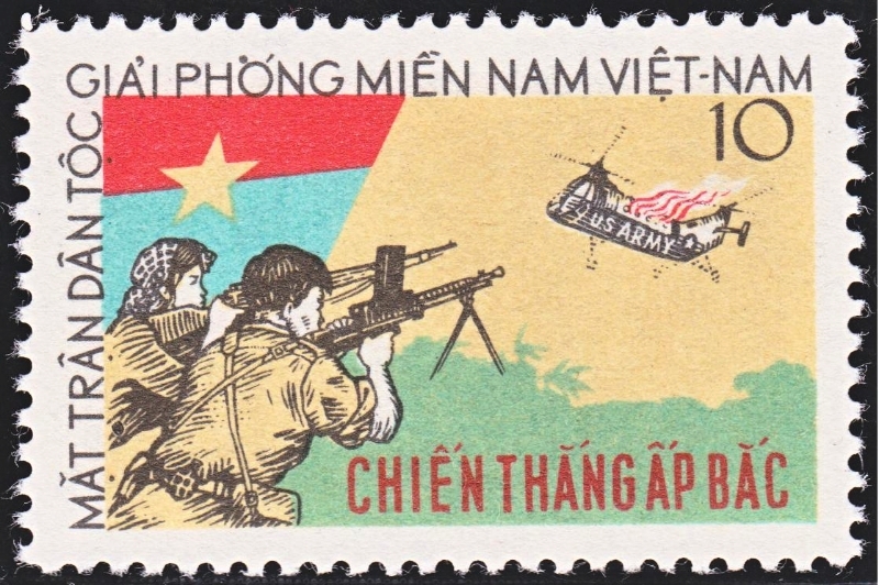 A Vietnamese stamp depicting two Vietnamese resistance fighters shooting down a US Army helicopter.