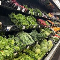 Vegetables and lettuces at a grocery store in Michigan. A summer of food recalls, including the record-shattering cyclosporiasis outbreak tied to iceberg lettuce that has sickened thousands, has raised many Americans’ fears of contracting a foodborne illness. (Photo by Jon King/Michigan Advance)